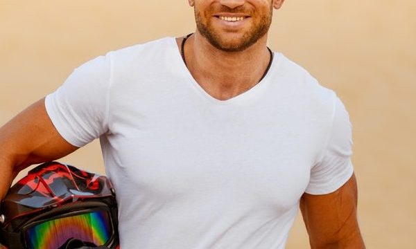 bearded-atv-racer-desert-sands-on-background-e1645570991258.jpg