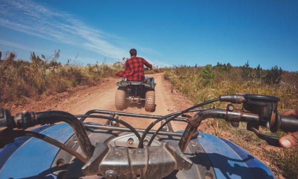 man-driving-off-road-on-an-atv-e1645641428532.jpg